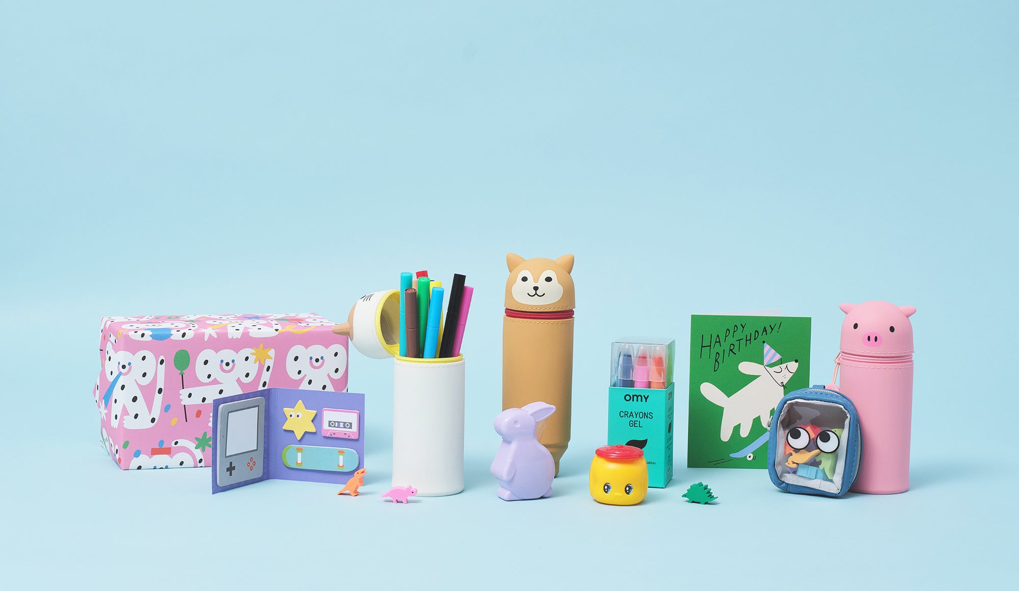 A collection of fun and original kids stationery and cards on a blue background
