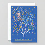 blue birthday card with sparkly fireworks and a gold happy birthday at the bottom