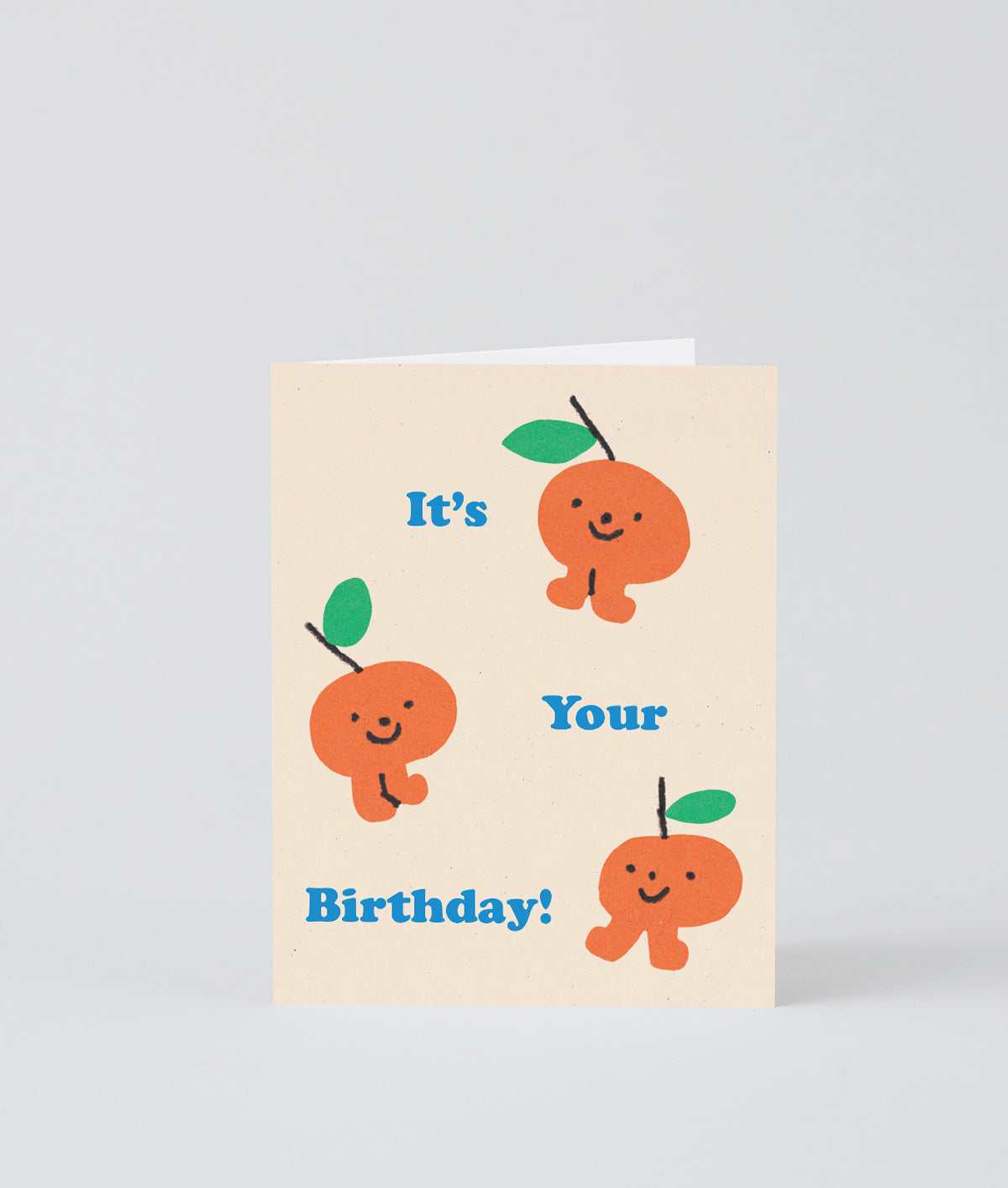 three sweet little oranges celebrating a birthday on a cream background with blue writing that reads it's your birthday!