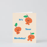 three sweet little oranges celebrating a birthday on a cream background with blue writing that reads it's your birthday!