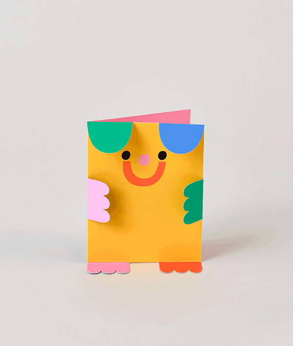 gif animation of yellow die cut bear kids birthday card with green and blue arms, and red and pink feet