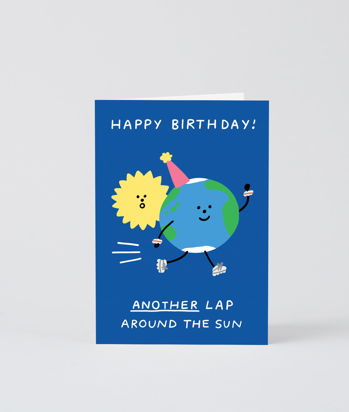 the earth is racing around the sun on a blue background on this birthday card