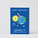 the earth is racing around the sun on a blue background on this birthday card