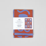 Making Faces Blue/Brown Tea Towel