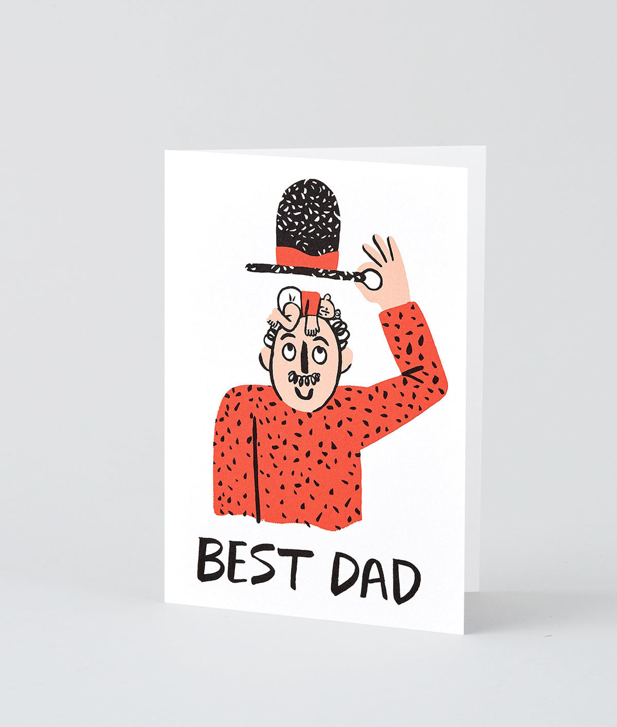 A card which says Best Dad and shows a baby on top of a man's head asleep under his hat