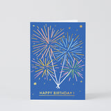 blue birthday card with sparkly fireworks and a gold happy birthday at the bottom