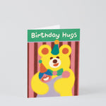 a big birthday bear hug on this stripy birthday card for kids. a big yellow bear hugs a person in a party hat and it says Birthday Hugs on a green background.